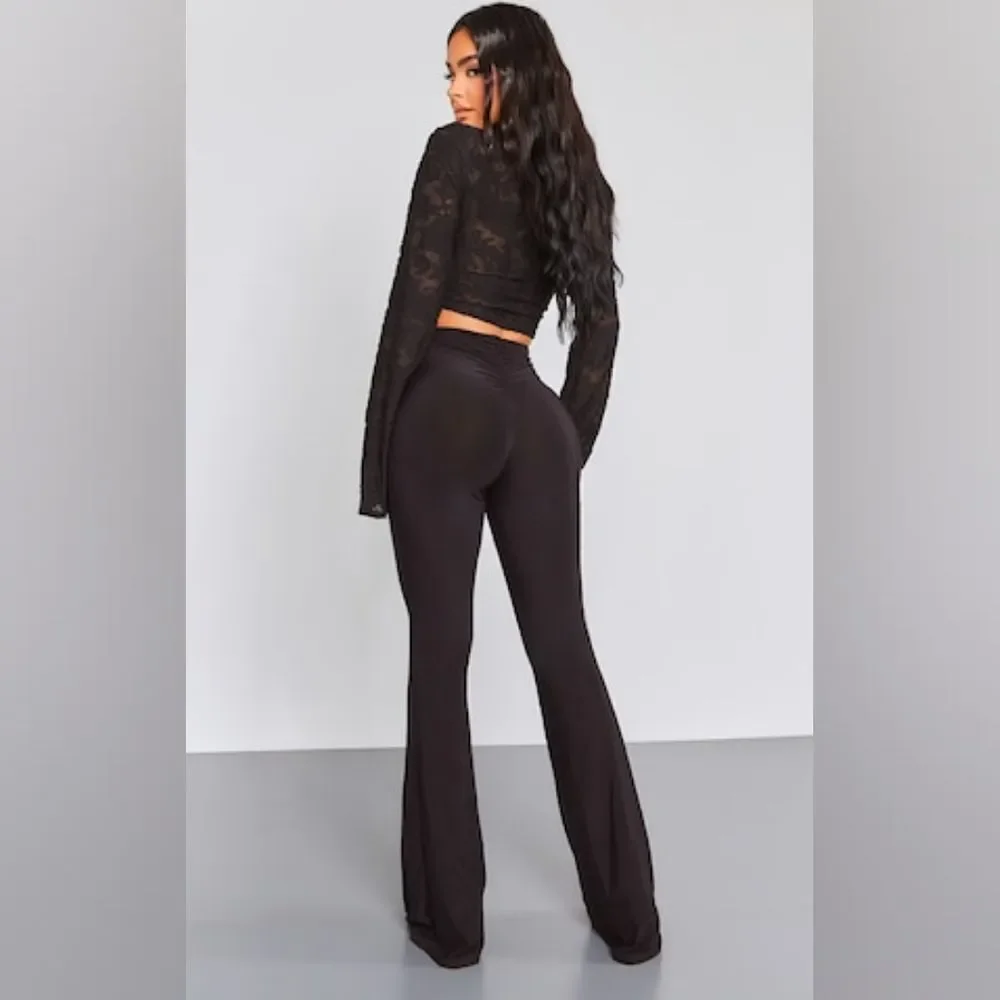PrettyLittleThing Petite Black Flare Ruched Bum Slinky Pants Size 6 in black NWT